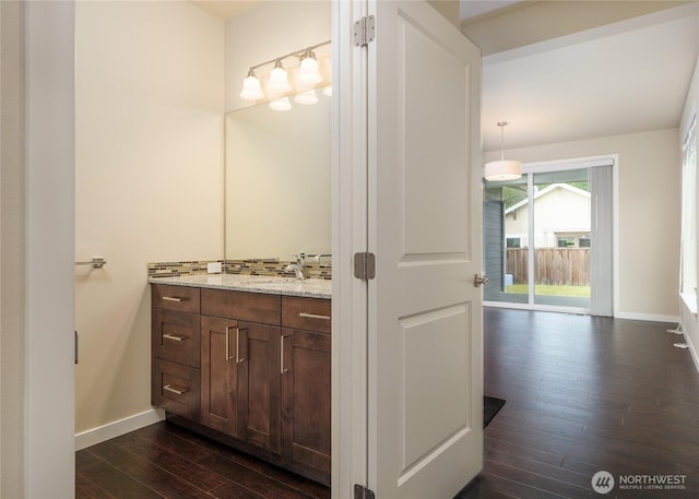421 Lofgrin Rd, Sequim, WA 98382 - bathroom featuring wood-type flooring, vanity, and baseboards