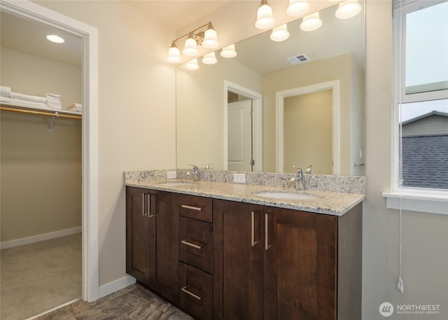 421 Lofgrin Rd, Sequim, WA 98382 - full bath with double vanity, baseboards, and a spacious closet