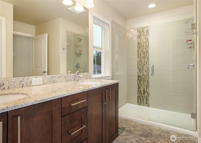 421 Lofgrin Rd, Sequim, WA 98382 - bathroom featuring a stall shower, double vanity, and recessed lighting