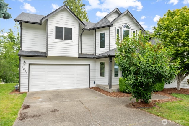 1258 NW Timber Shadow Ct, Silverdale, WA 98380 - view of front facade with an attached garage, driveway, roof with shingles, and a front yard