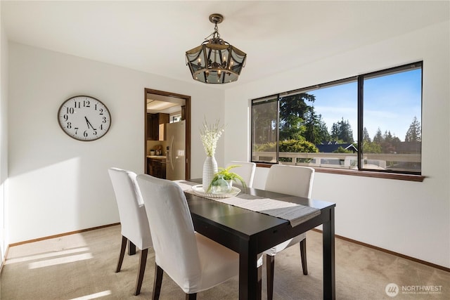 18801 86th Pl W, Edmonds, WA 98026 - dining area with light carpet and a chandelier