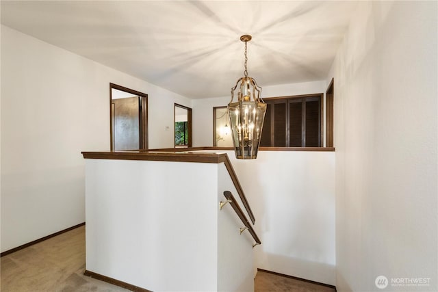 18801 86th Pl W, Edmonds, WA 98026 - staircase with a chandelier and carpet floors