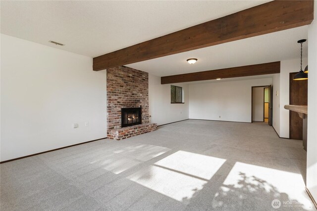 18801 86th Pl W, Edmonds, WA 98026 - unfurnished living room with a brick fireplace, light colored carpet, and beamed ceiling