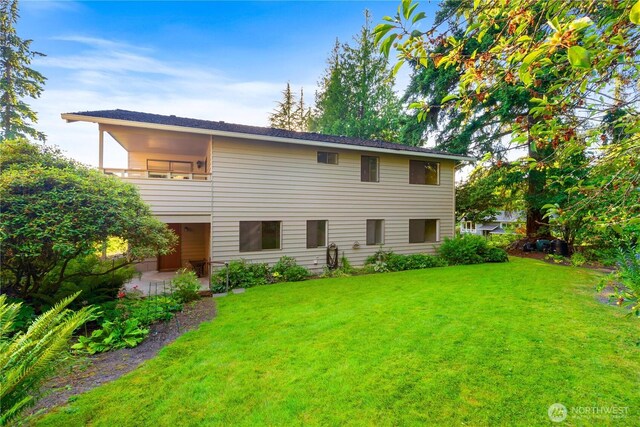 18801 86th Pl W, Edmonds, WA 98026 - rear view of property with a lawn