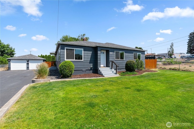 367 1st St SE, East Wenatchee, WA 98802 - view of front of property featuring a garage, an outdoor structure, and crawl space