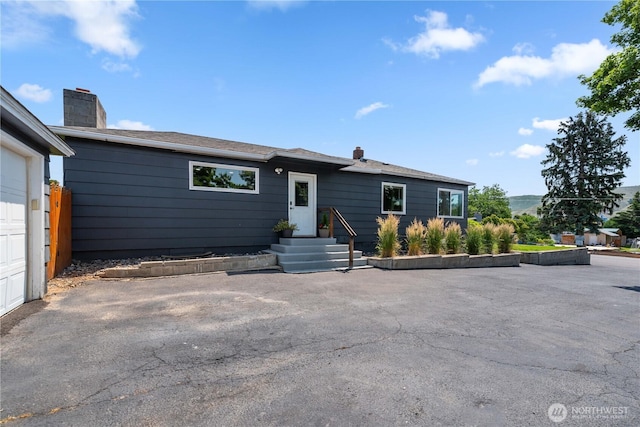 367 1st St SE, East Wenatchee, WA 98802 - view of front of house featuring a chimney