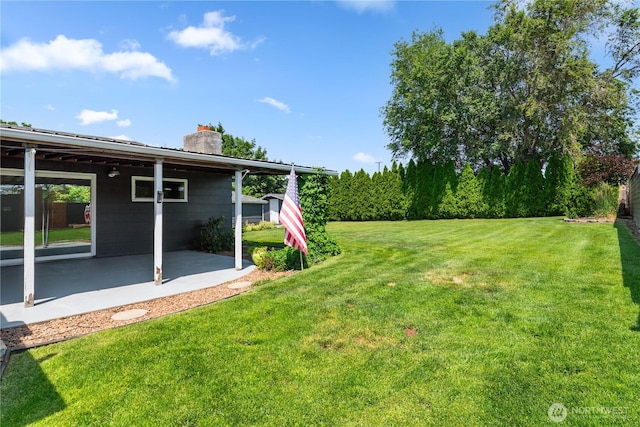 367 1st St SE, East Wenatchee, WA 98802 - view of grassy yard featuring a patio area