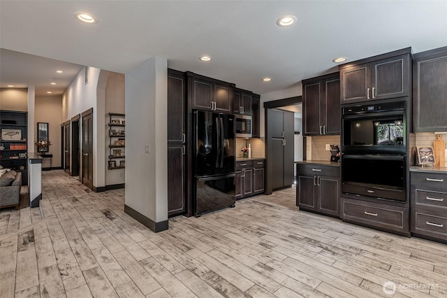 628 Meadows Dr, Wenatchee, WA 98801 - kitchen featuring black appliances, light wood-style flooring, backsplash, and recessed lighting