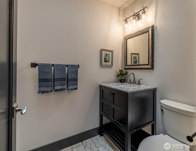 628 Meadows Dr, Wenatchee, WA 98801 - bathroom with vanity, toilet, and wood finished floors