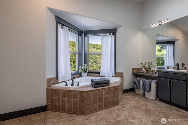 628 Meadows Dr, Wenatchee, WA 98801 - bathroom with vanity, a bath, and baseboards