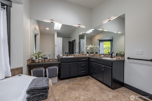 628 Meadows Dr, Wenatchee, WA 98801 - bathroom featuring double vanity and a bath