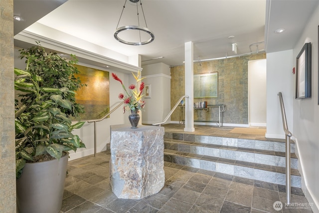 732 11th Ave E Unit 202, Seattle, WA 98102 - staircase with baseboards and recessed lighting