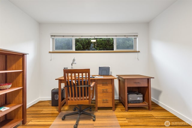 732 11th Ave E Unit 202, Seattle, WA 98102 - office area with wood finished floors and baseboards