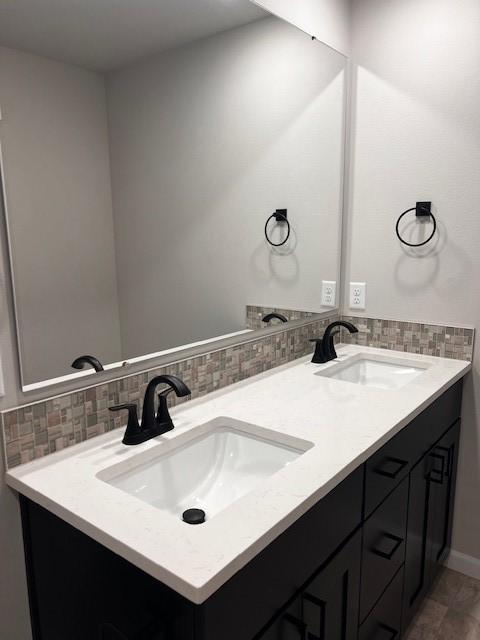 12092 126th Avenue Ct E Unit 70, Puyallup, WA 98374 - full bath with double vanity and tasteful backsplash