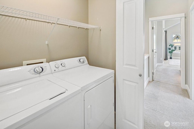 7121 Shinkle Pl SW, Seattle, WA 98106 - washroom featuring washer and dryer, light carpet, and baseboards