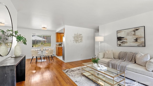 19932 NE 175th St, Woodinville, WA 98077 - living area featuring light wood-style flooring and baseboards