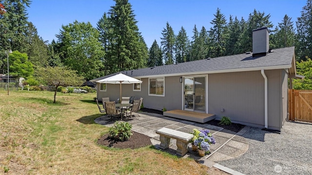 19932 NE 175th St, Woodinville, WA 98077 - back of house with a chimney, a patio area, and roof with shingles
