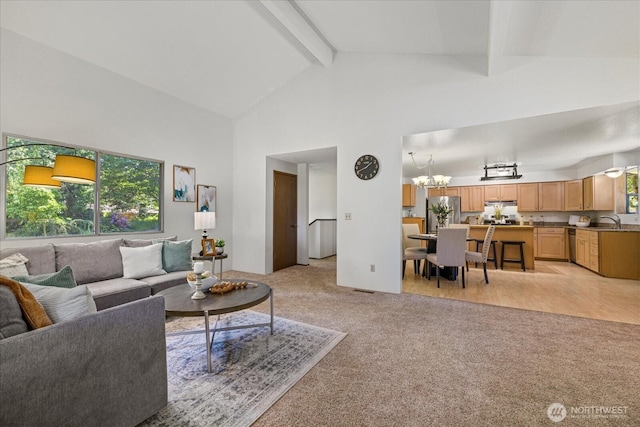 7223 NE 160th St, Kenmore, WA 98028 - living area featuring light carpet, beamed ceiling, high vaulted ceiling, and a chandelier