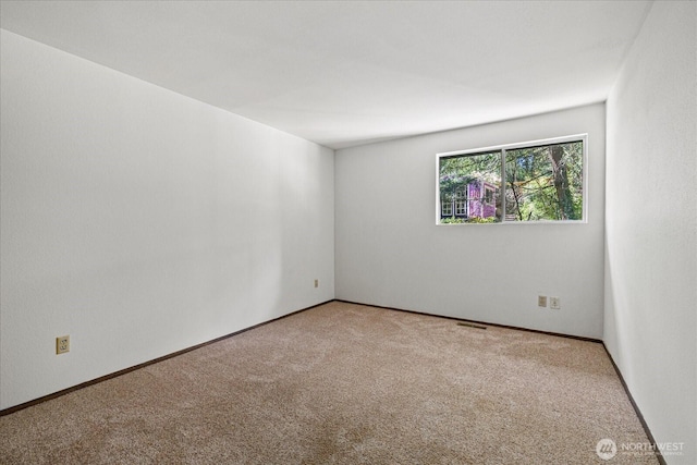 7223 NE 160th St, Kenmore, WA 98028 - carpeted spare room featuring baseboards