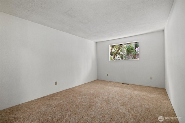 7223 NE 160th St, Kenmore, WA 98028 - unfurnished room featuring carpet and a textured ceiling