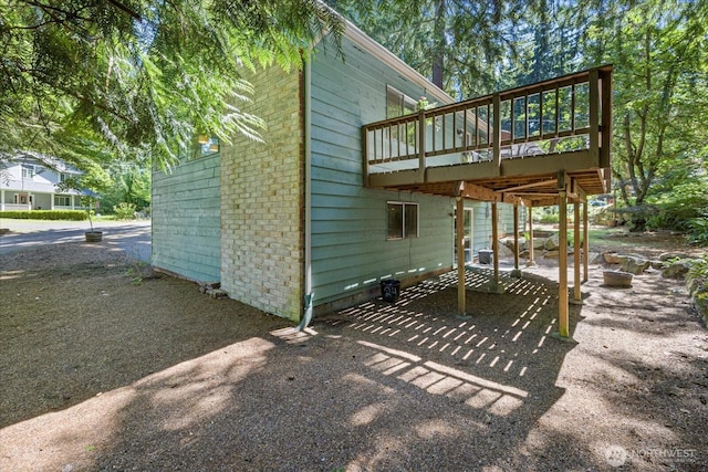 7223 NE 160th St, Kenmore, WA 98028 - rear view of property featuring a wooden deck and a patio
