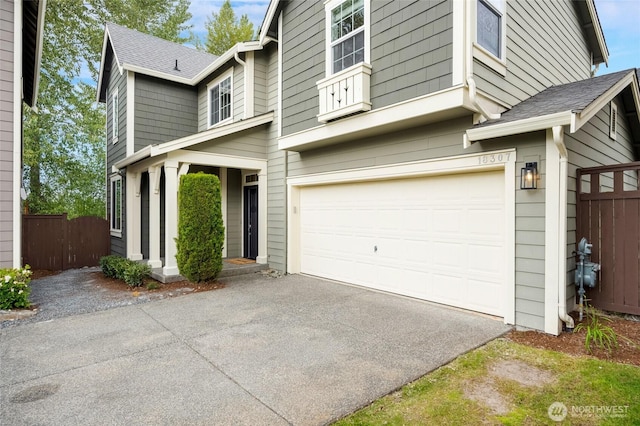 18307 38th Dr SE, Bothell, WA 98012 - view of front facade with asphalt driveway, a garage, and roof with shingles