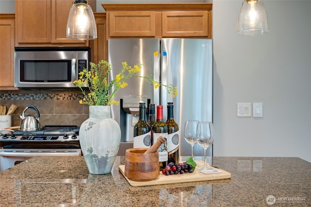 18307 38th Dr SE, Bothell, WA 98012 - kitchen with stainless steel appliances, tasteful backsplash, pendant lighting, and light stone counters