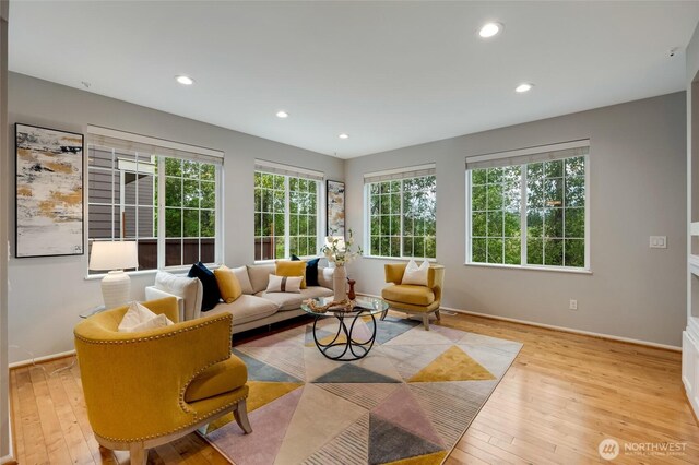 18307 38th Dr SE, Bothell, WA 98012 - living area featuring wood-type flooring, recessed lighting, and baseboards
