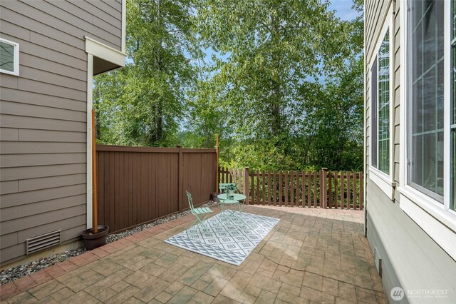 18307 38th Dr SE, Bothell, WA 98012 - fenced backyard featuring a patio