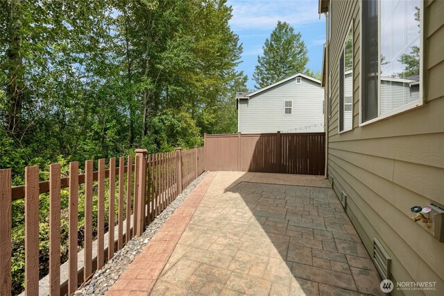 18307 38th Dr SE, Bothell, WA 98012 - fenced backyard with a patio