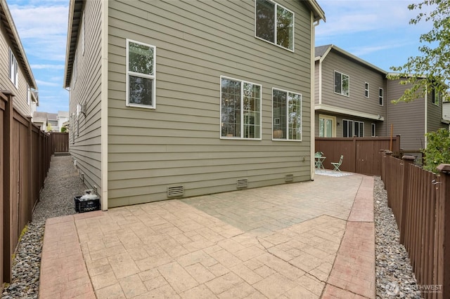 18307 38th Dr SE, Bothell, WA 98012 - rear view of house featuring crawl space, a patio, and a fenced backyard