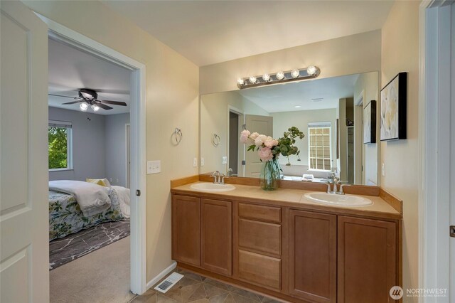 18307 38th Dr SE, Bothell, WA 98012 - ensuite bathroom with double vanity and ceiling fan