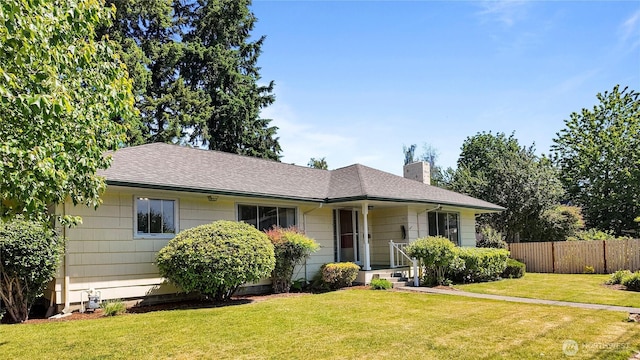 2502 Thurston Ave NE, Olympia, WA 98506 - view of front of home featuring a chimney and roof with shingles