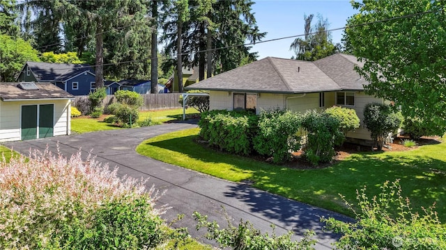 2502 Thurston Ave NE, Olympia, WA 98506 - view of side of property featuring a shingled roof