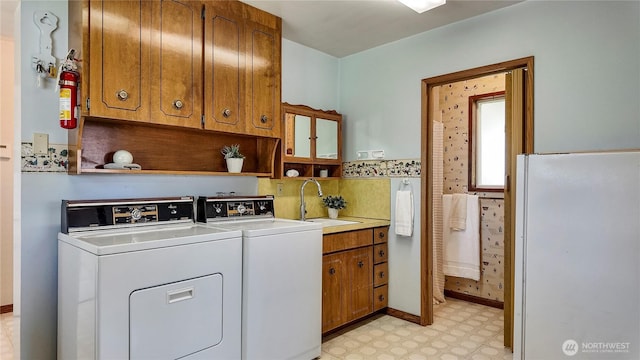 2502 Thurston Ave NE, Olympia, WA 98506 - laundry area with washer and dryer, cabinet space, and light flooring