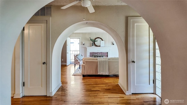 2502 Thurston Ave NE, Olympia, WA 98506 - hall with wood finished floors and arched walkways