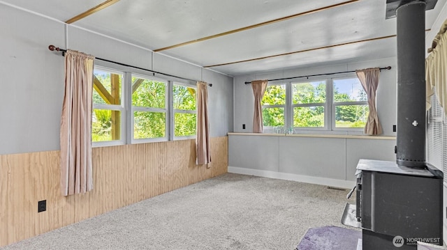 13010 168th St NE, Arlington, WA 98223 - sunroom featuring a wood stove and plenty of natural light