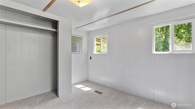 13010 168th St NE, Arlington, WA 98223 - unfurnished bedroom with multiple windows, carpet floors, and a closet