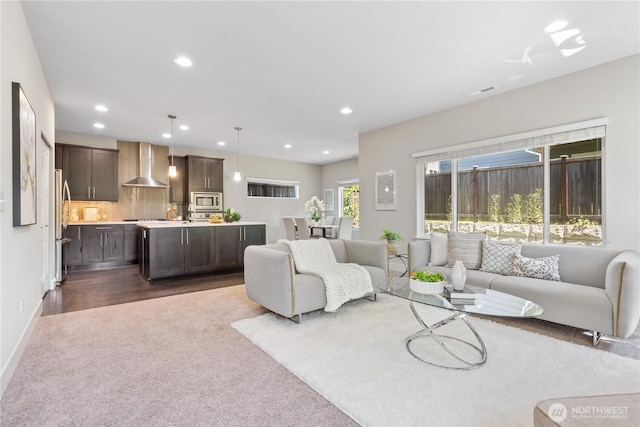 4008 223rd Pl SE, Bothell, WA 98021 - living room featuring dark carpet and recessed lighting