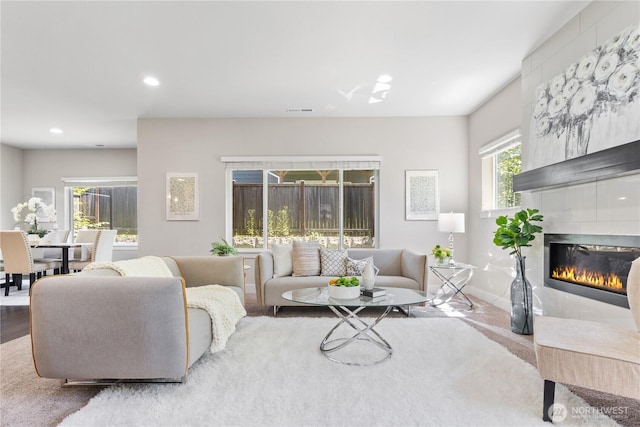 4008 223rd Pl SE, Bothell, WA 98021 - living area featuring a tiled fireplace and recessed lighting