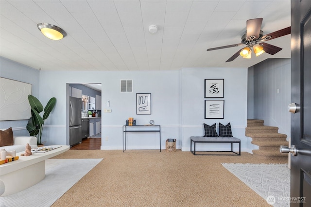1254 Mchugh Ave, Enumclaw, WA 98022 - carpeted living area featuring ceiling fan, stairs, and a sink