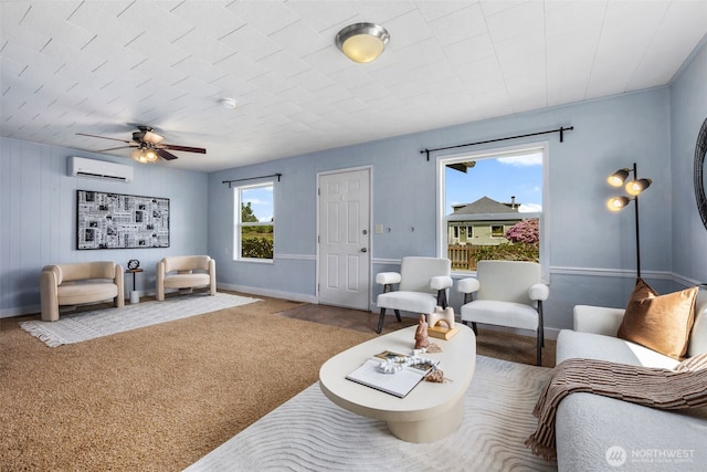 1254 Mchugh Ave, Enumclaw, WA 98022 - carpeted living area featuring an AC wall unit, ceiling fan, and baseboards