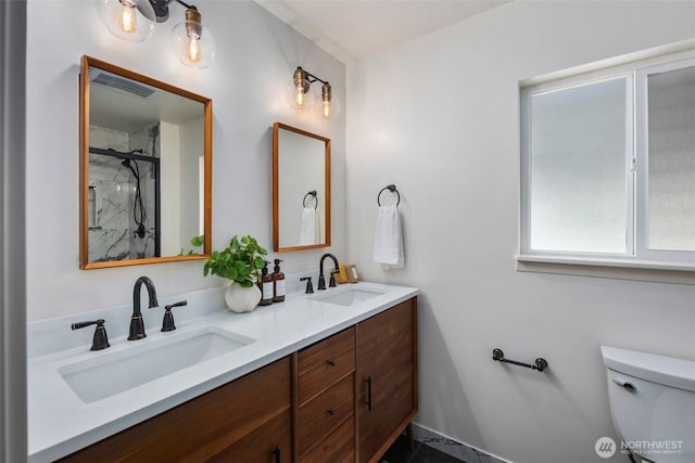 1254 Mchugh Ave, Enumclaw, WA 98022 - bathroom with a marble finish shower, double vanity, and toilet