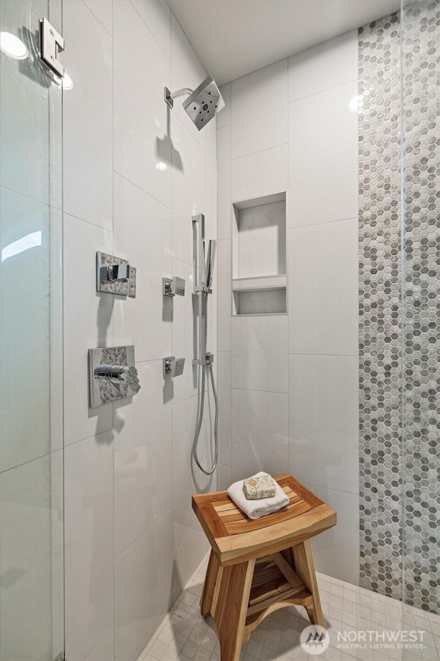 4576 22nd Ave SW, Seattle, WA 98106 - bathroom featuring a shower stall and tile walls