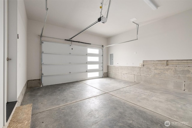 4576 22nd Ave SW, Seattle, WA 98106 - garage featuring a garage door opener and electric panel