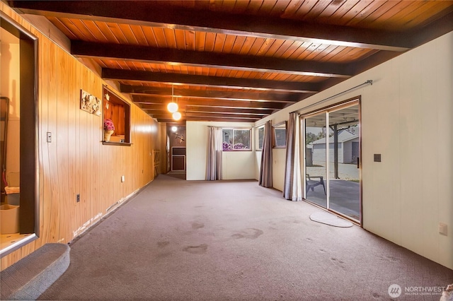 220 Alder Ave, Sumner, WA 98390 - spare room with carpet, wood walls, and wooden ceiling with exposed beams
