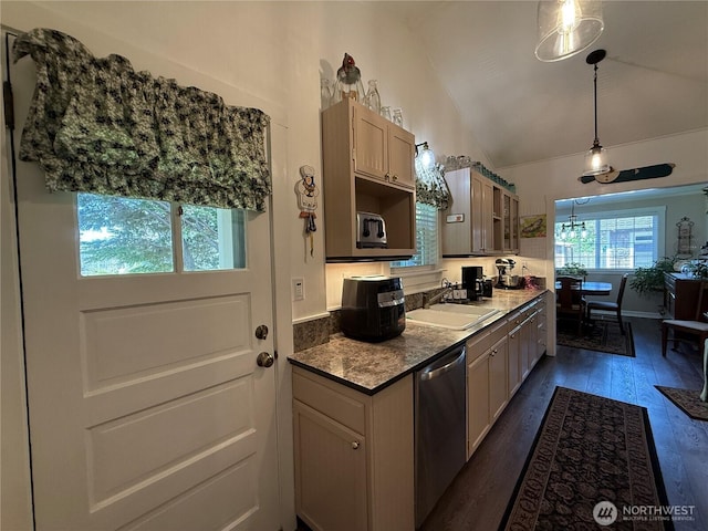 115 15th St SW, Long Beach, WA 98631 - kitchen featuring stainless steel dishwasher, a sink, dark wood finished floors, vaulted ceiling, and hanging light fixtures