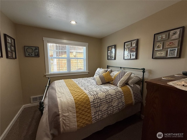 115 15th St SW, Long Beach, WA 98631 - bedroom with carpet floors, baseboards, and recessed lighting