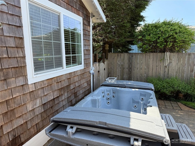 115 15th St SW, Long Beach, WA 98631 - view of patio / terrace featuring a hot tub