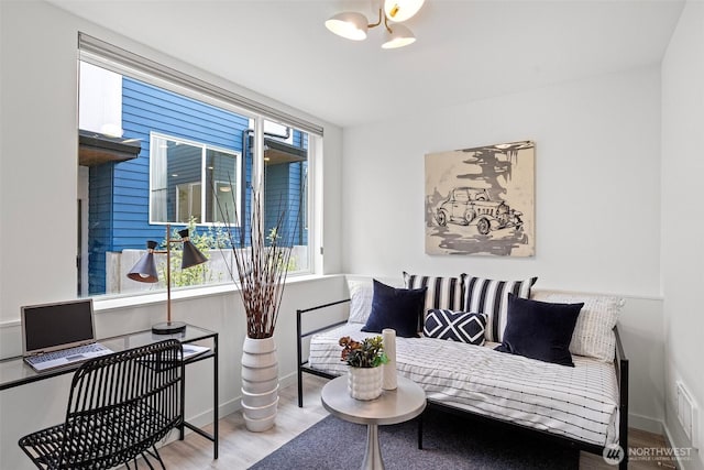2527 29th Ave S Unit A, Seattle, WA 98144 - living area with wood finished floors and a desk